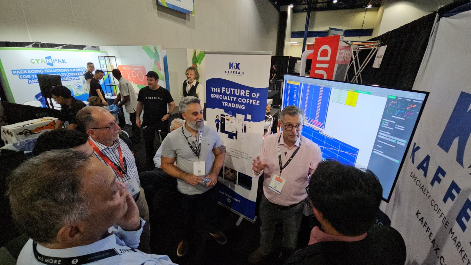 KAFFEAIX trade show booth showcasing the future of specialty coffee trading with interactive displays and market data